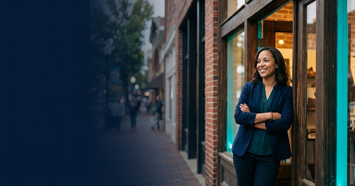 North Carolina small business owner reviewing employee health insurance options on a laptop